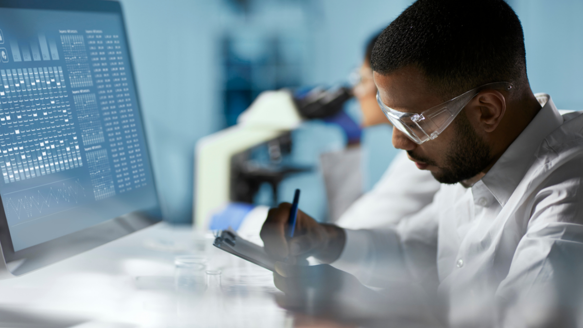 Scientist analyzing diagnostic data in a clinical laboratory